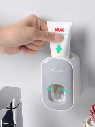 automatic toothpaste dispenser and holder